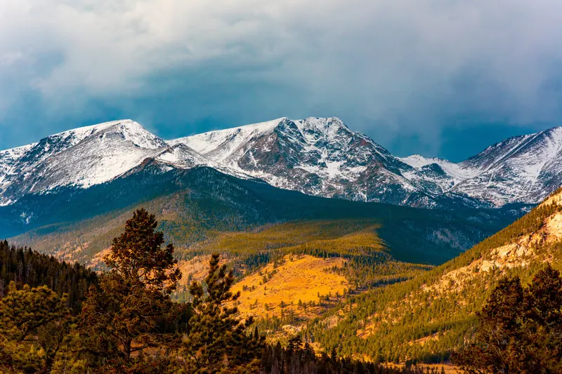 Pikes Peak with fresh snow above autumn aspens near Colorado Springs